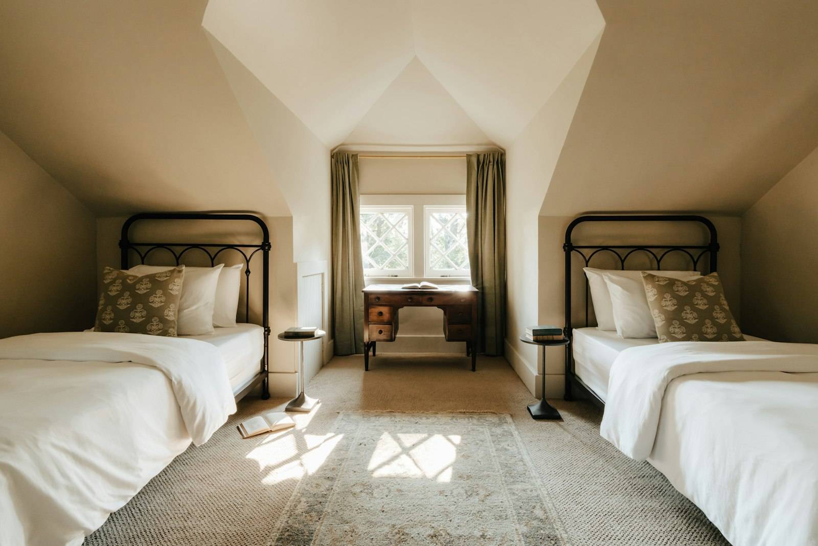 The twin room, with two single beds under a sloped ceiling